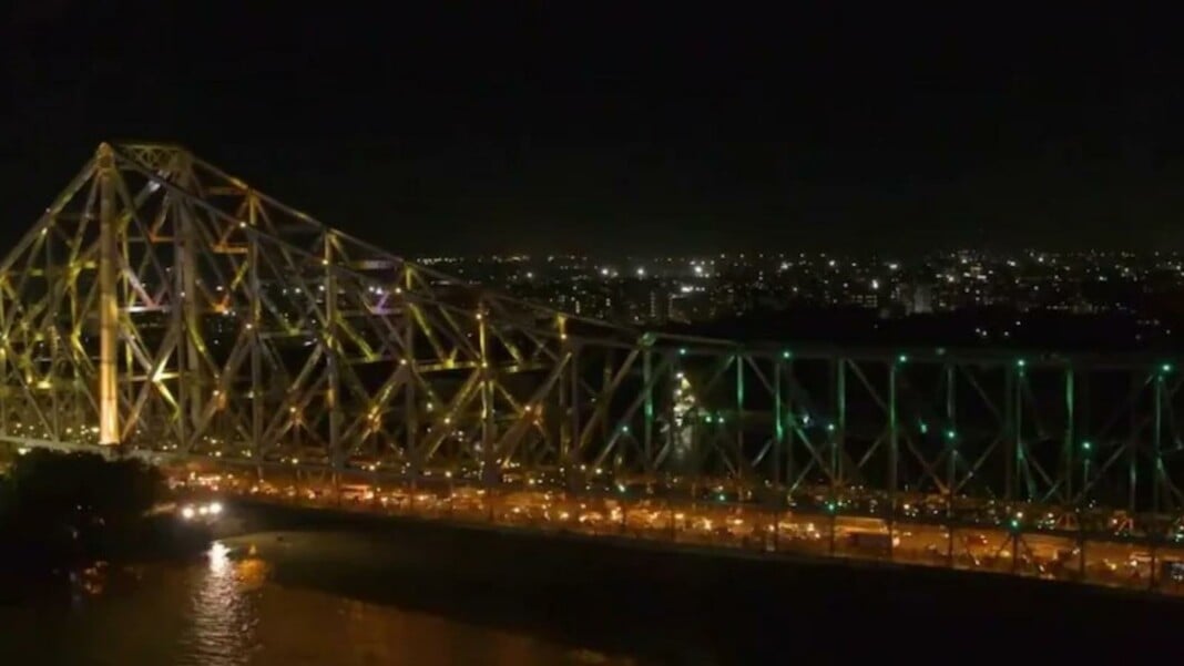 Howrah Bridge lit up in Olympic colors ahead of Tokyo Olympics Howrah Bridge lit up in Olympic colors ahead of Tokyo Olympics