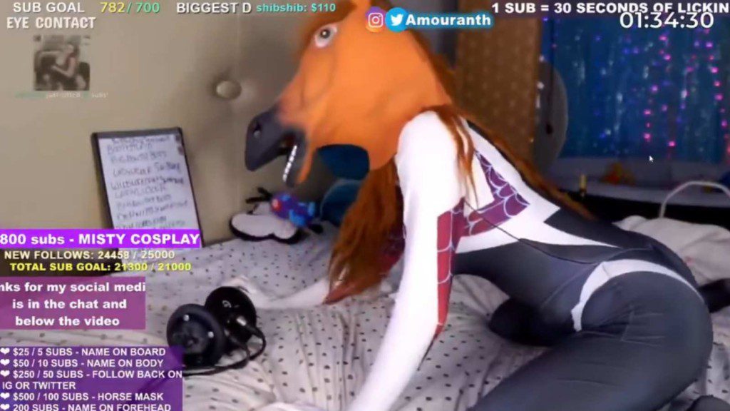 Amouranth with a horse mask on her head