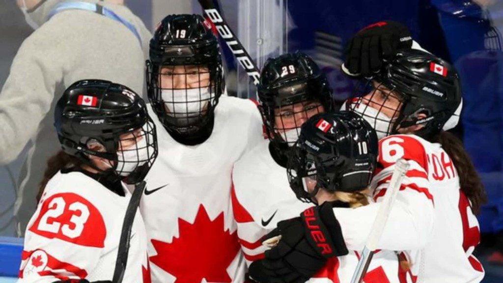 Winter Olympics Canadian and Russian women's hockey players wear masks