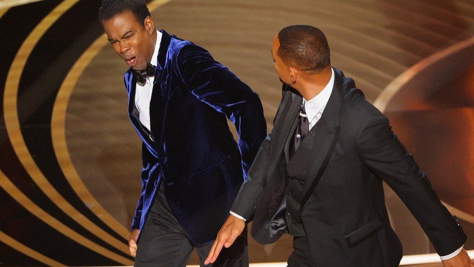 “Slap a ni**a and win an Oscar; Black history!” NBA world reacts to Will Smith smacking Chris Rock LIVE at the 2022 Oscars for joking about his wife