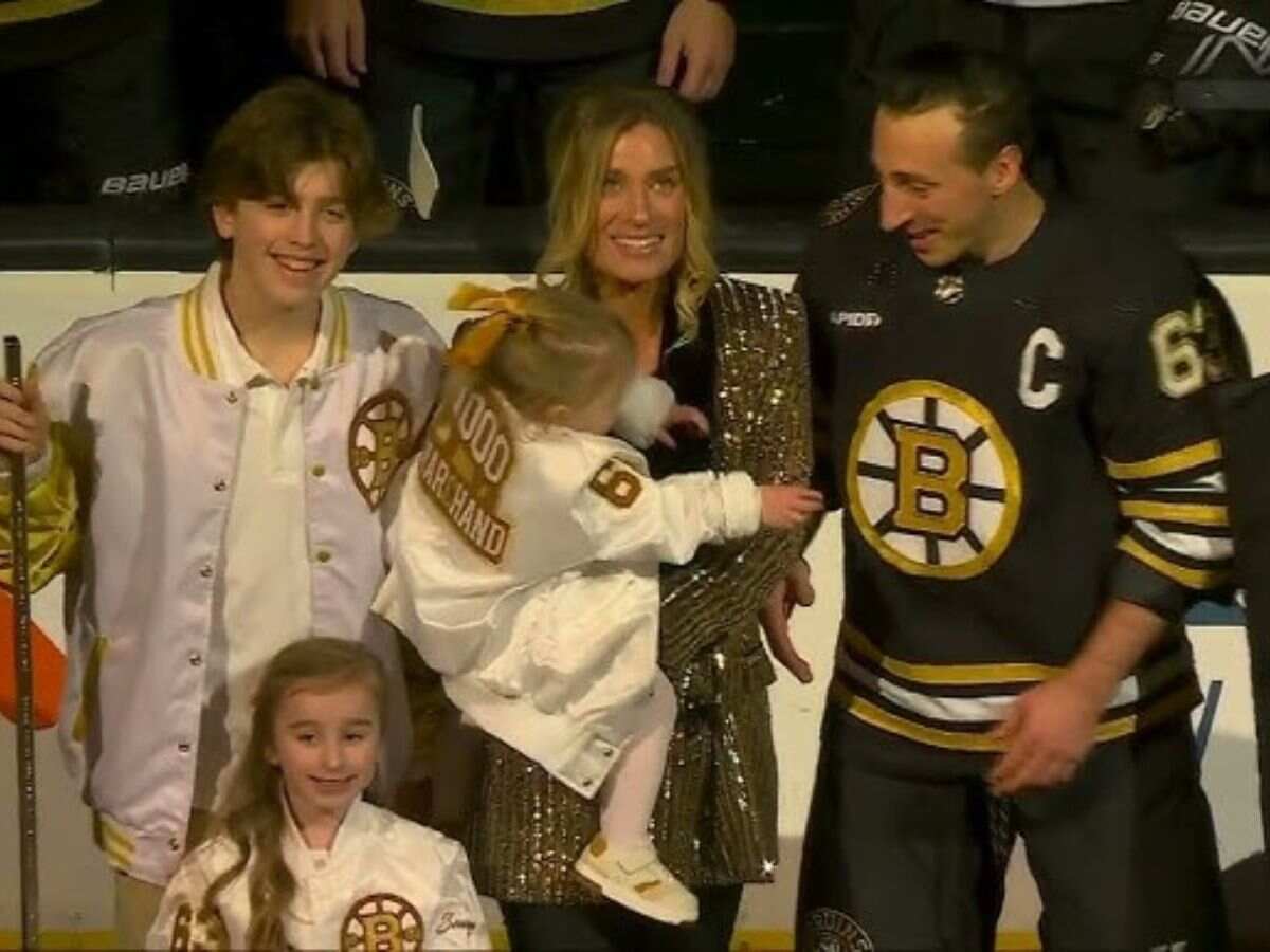 Brad Marchand, his wife and his children