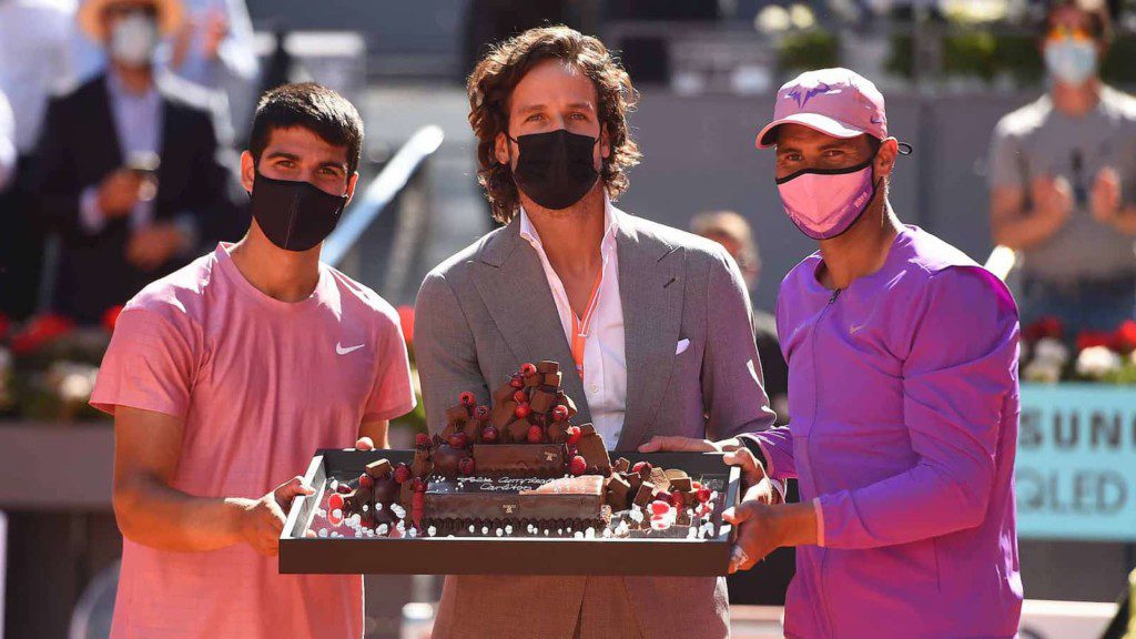 Carlos Alcaraz, Feliciano Lopez and Rafael Nadal celebrate Alcaraz's birthday at the 2021 Madrid Masters