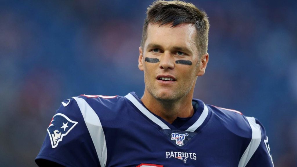 Tom Brady is a marketing genius, hires dude with sign to promote  underwear