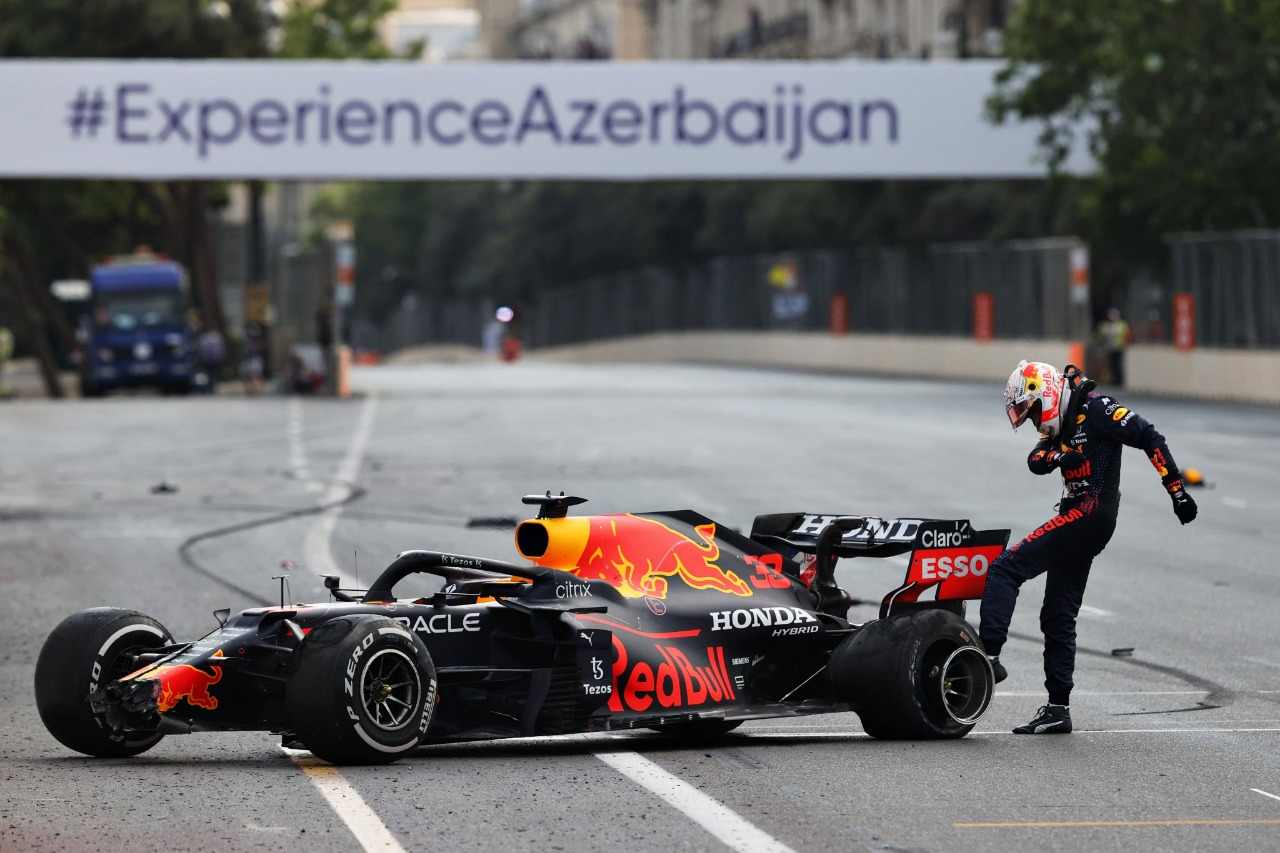 Max Verstappen kicking his car