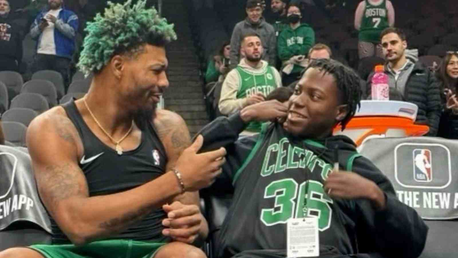 Who is Justice Brooks and why did Marcus Smart invite him to the game against the Atlanta Hawks?