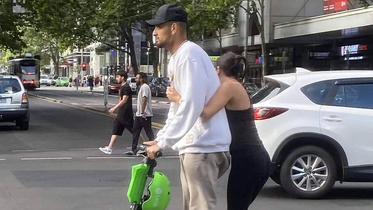 Careless Nick Kyrgios hauled up after a joyride with babe Costeen Hatzi on an e-scooter minus helmet in Melbourne