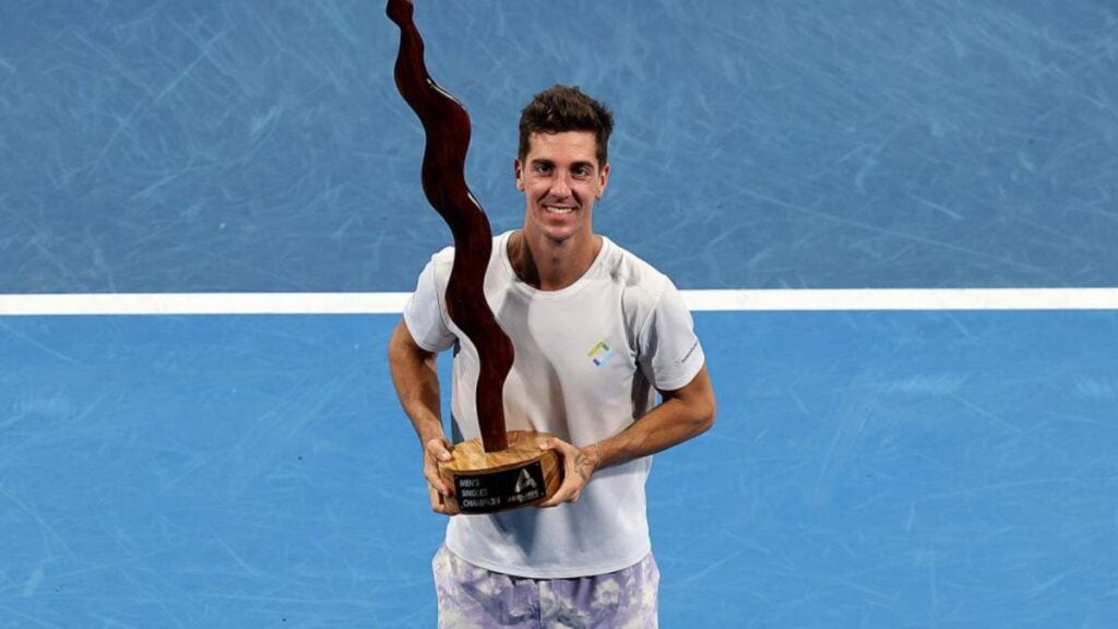 Thanasi Kokkinakis with the 2022 Adelaide International trophy