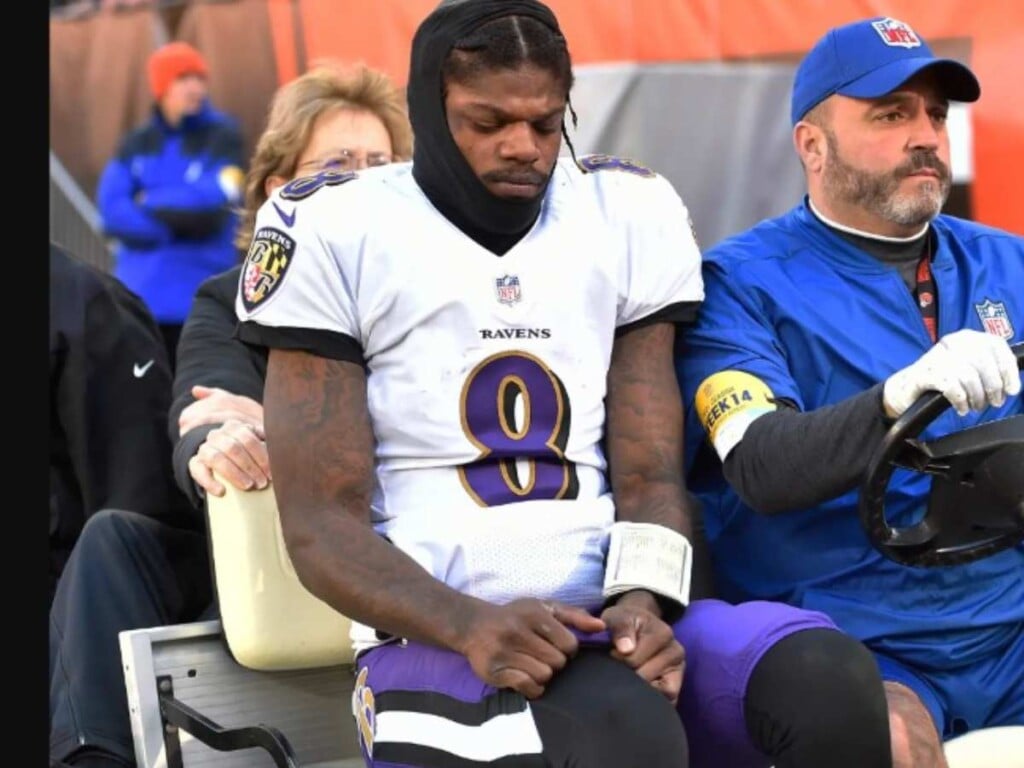 Lamar Jackson being carted off the field after PCL injury (Image via The New York Post)