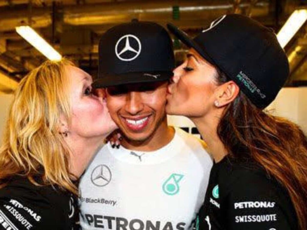 Lewis Hamilton with Grid Girls