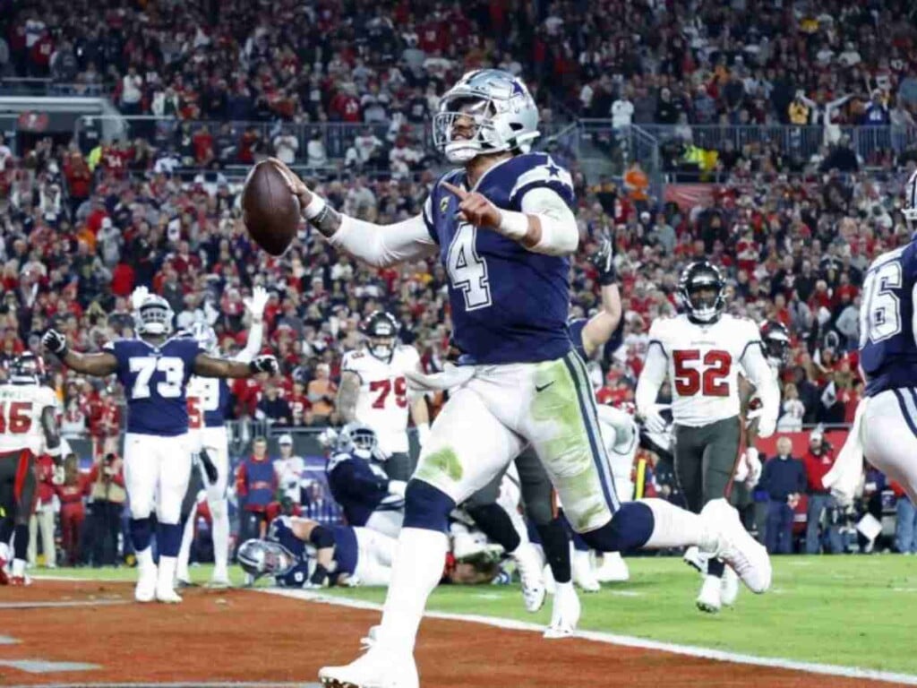 Dak Prescott walks into the endzone (Image via Getty)