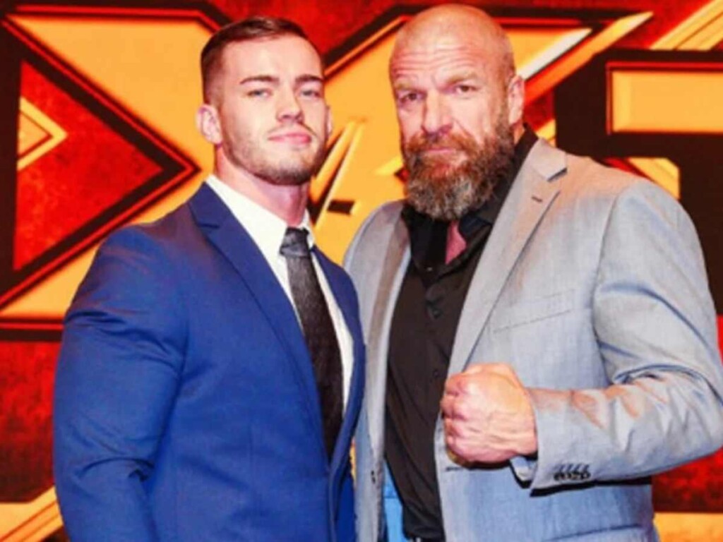 Triple H with Austin Theory (Image Credits- TJR Wrestling)