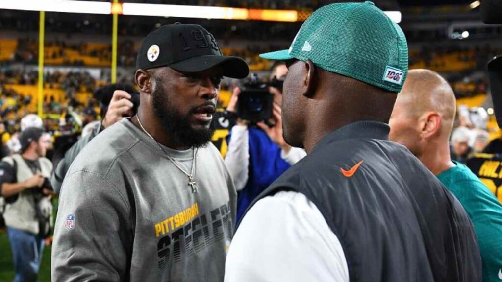 Mike Tomlin and Brian Flores (Image via Sporting News)