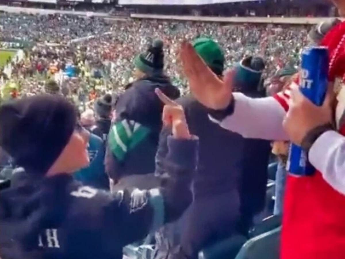 WATCH: “They teach them early out in Philthydelphia” – NFL Twitter reacts as a young Eagles fan flipped the bird to a 49ers fan during the NFC Championship game