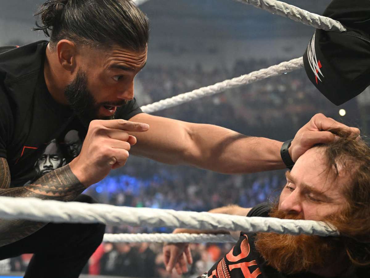 WATCH: Sami Zayn delivers a picture-perfect spear to Roman Reigns on ...