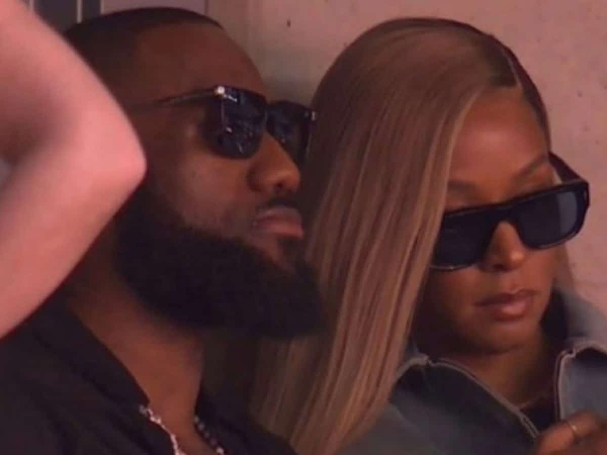 Lakers star LeBron James in black shirt & Nike sneakers makes an appearance with wife Savannah at Super Bowl LVII