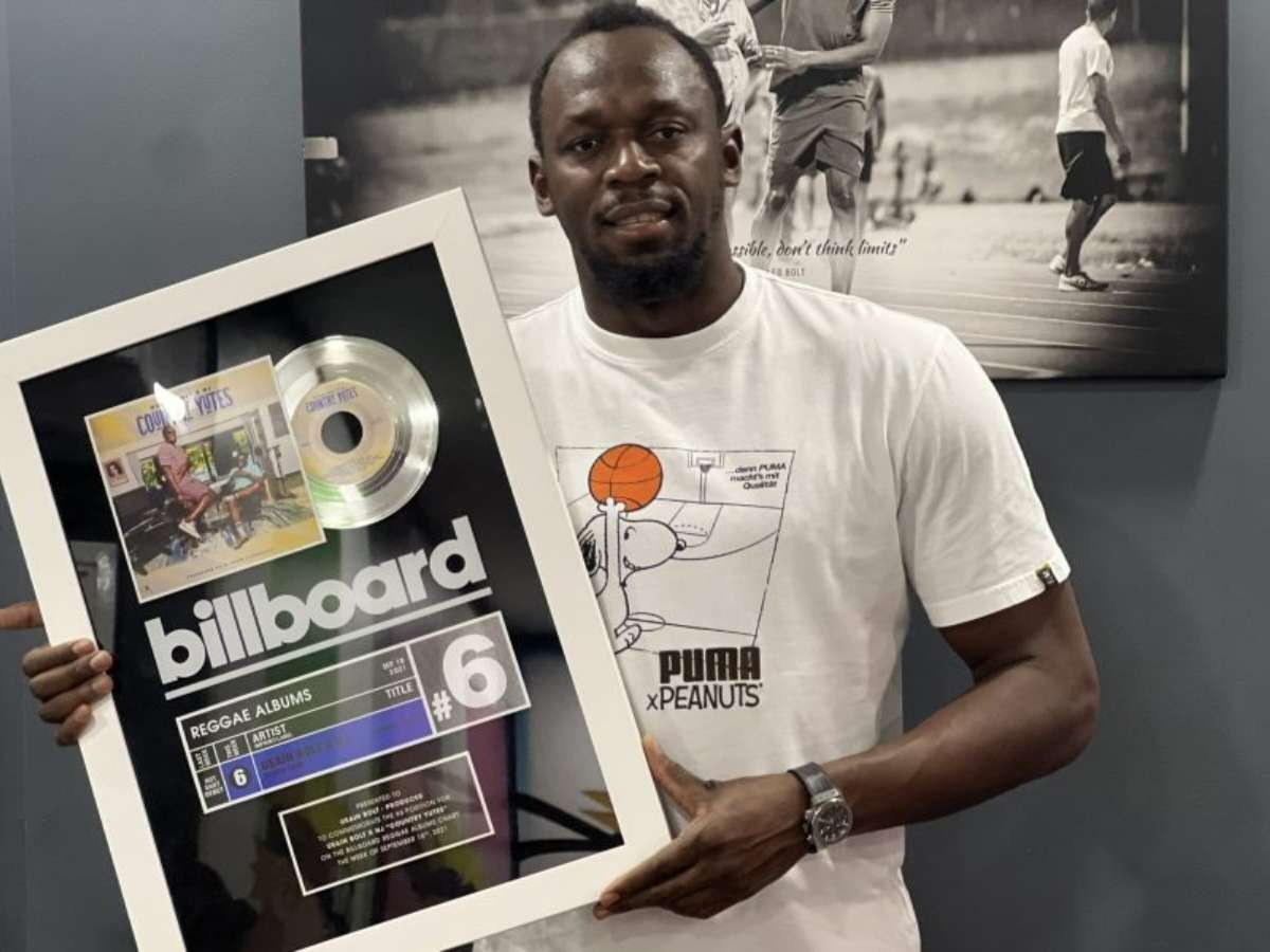 Usain Bolt thanks fans after receiving Billboard Plaque for his album peaking in the Billboard Reggae charts at Top 6