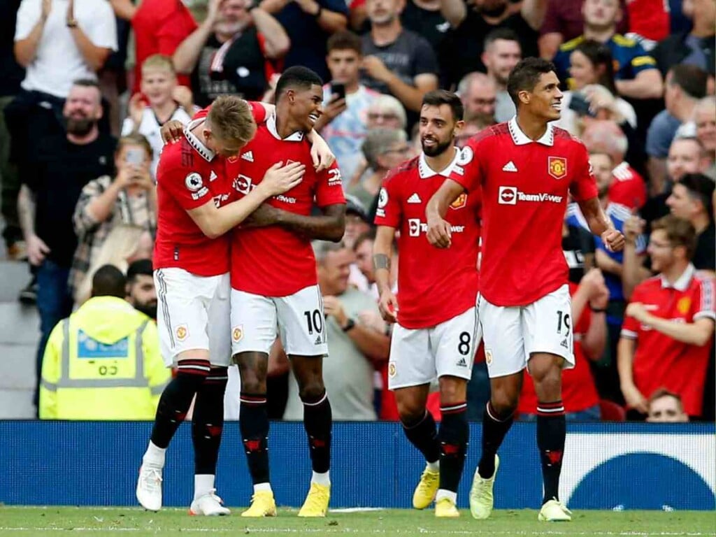 Manchester United members celebrating a win