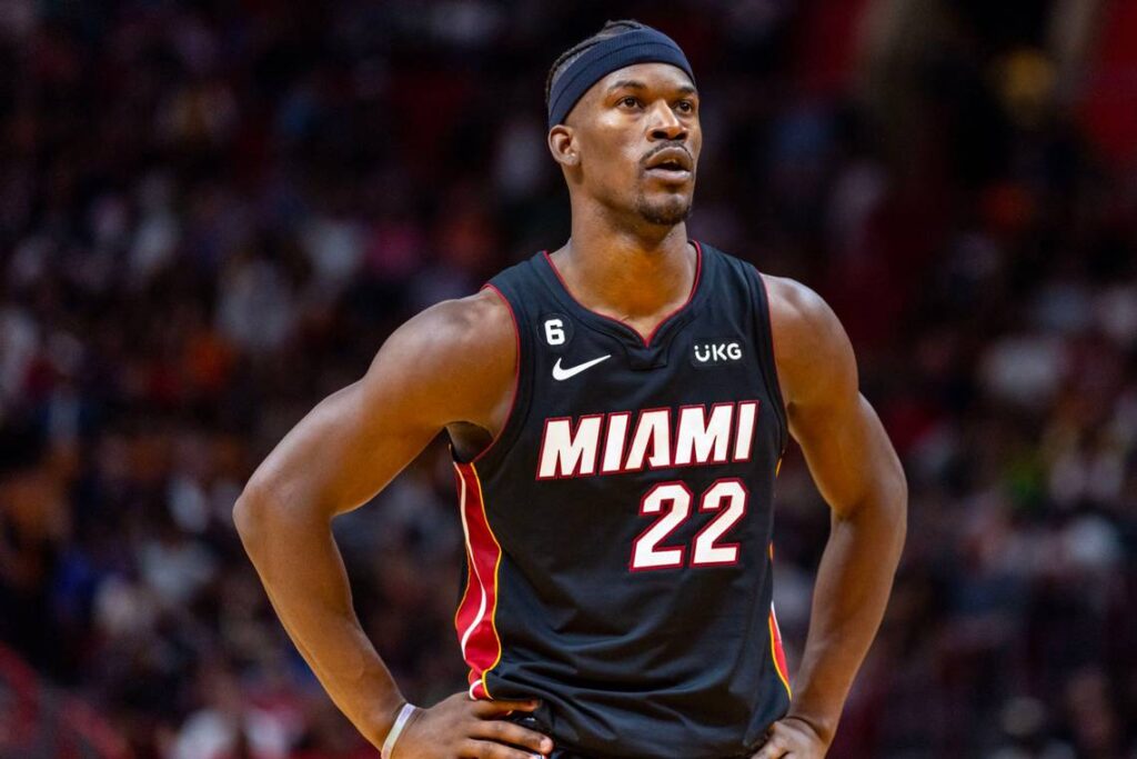 Jimmy Butler nails a sweeping reverse lay-up over Joel Embiid to cease the Miami Heat's losing run 1 MIA HEAT SUNS DAV49