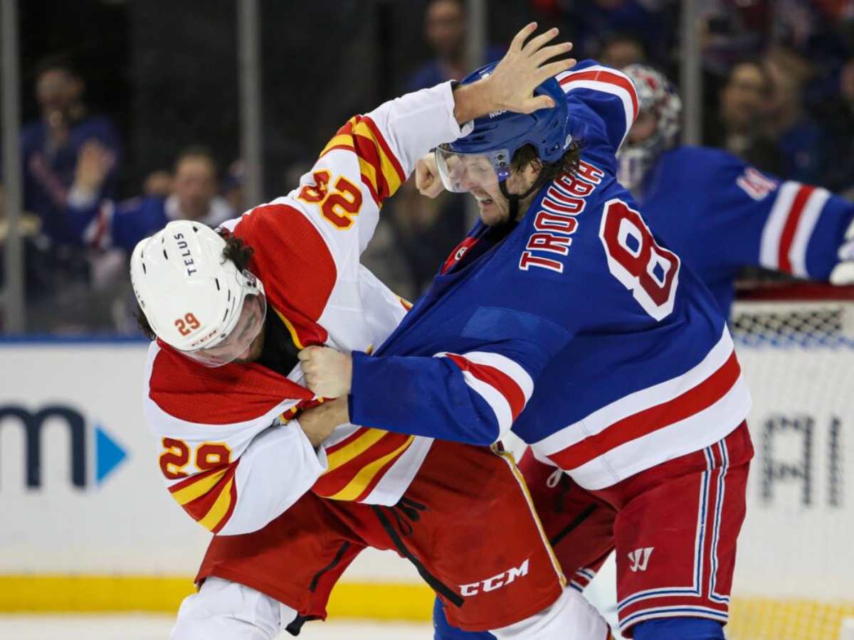 <strong></noscript>WATCH – Jacob Trouba’s MONSTROUS hit on Dillon Dube followed by dismantling Chris Tanev ignites chaos in Rangers-Flames thriller</strong>