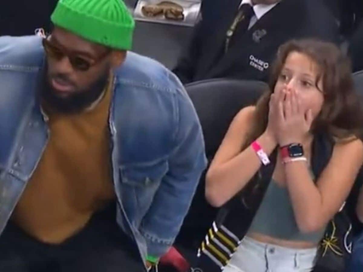 LeBron James surprises young fan as he sits next to her during game against Warriors