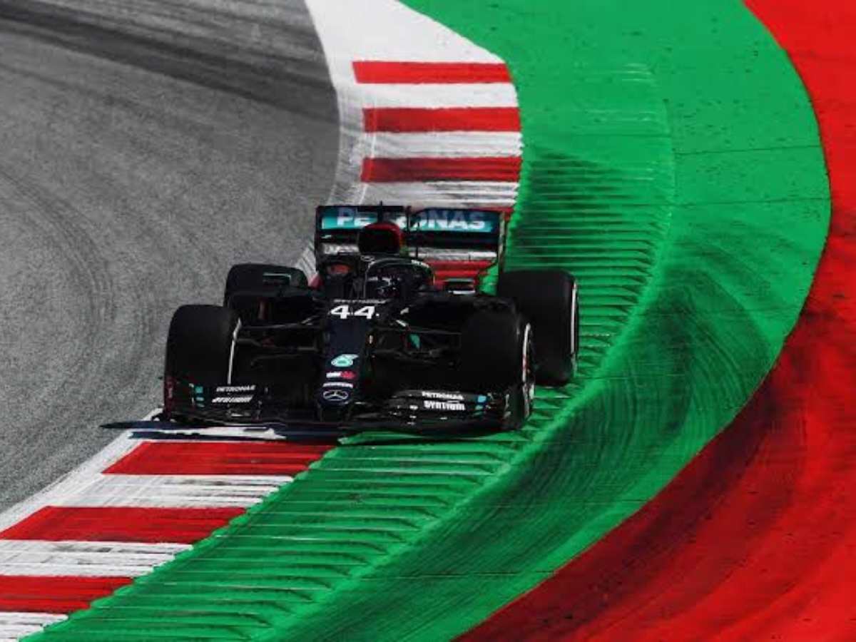 Why do Formula 1 tracks have kerbs?