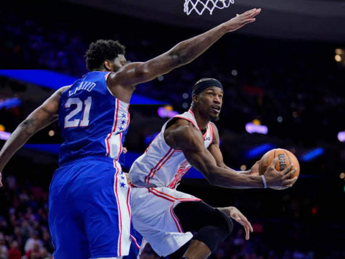 Jimmy Butler nails a sweeping reverse lay-up over Joel Embiid to cease the Miami Heat’s losing run