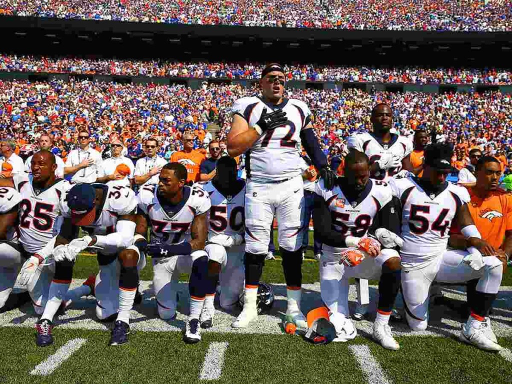 Players kneeling during national anthem (Image via Sports Illustrated) Donald Trump