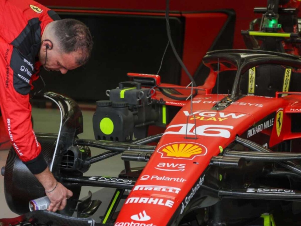 Ferrari mechanic working on the SF23