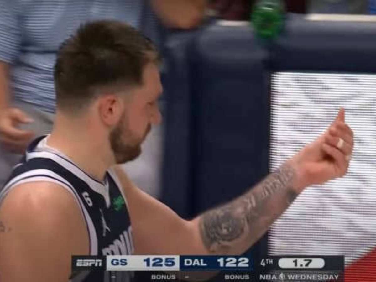 WATCH: ‘Joke of a league!’ – Luka Doncic BOLDLY makes the money motion at the referee claiming he has been ‘paid’ after a terrible no-call against the Warriors