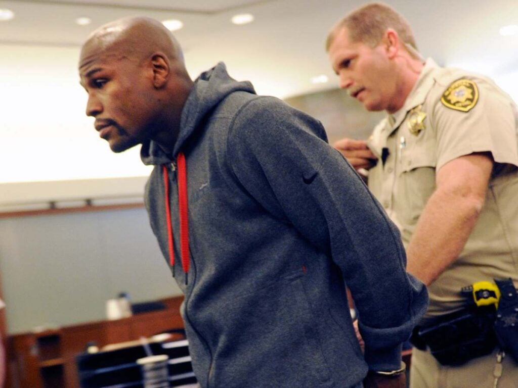 Why did Floyd Mayweather Jr. go to prison?