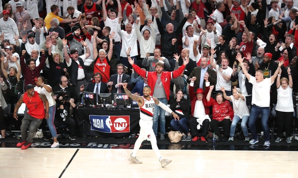 Damian Lillard waving at OKC bench