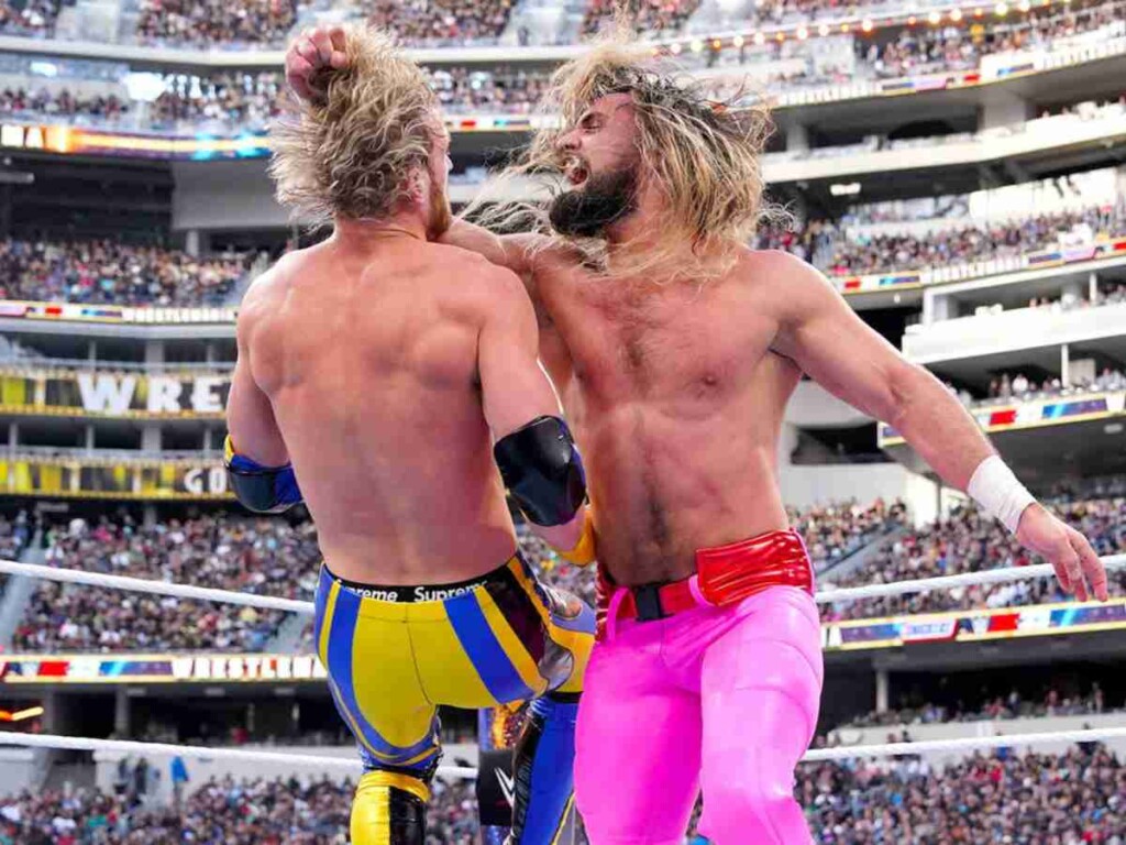 Seth Rollins vs. Logan Paul exchanging blows at WrestleMania last night