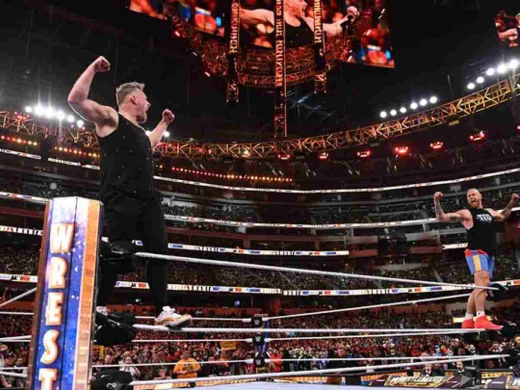 Pat McAfee and George Kittle celebrate at WrestleMania 39