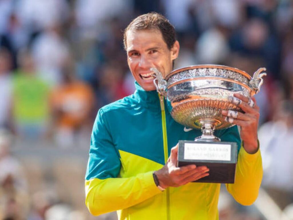 Rafael Nadal with his 2022 French Open trophy (via Getty)