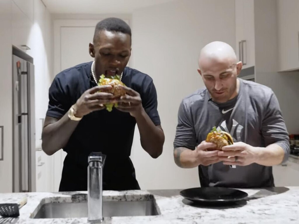 Israel Adesanya cooking with Alexander Volkanovski