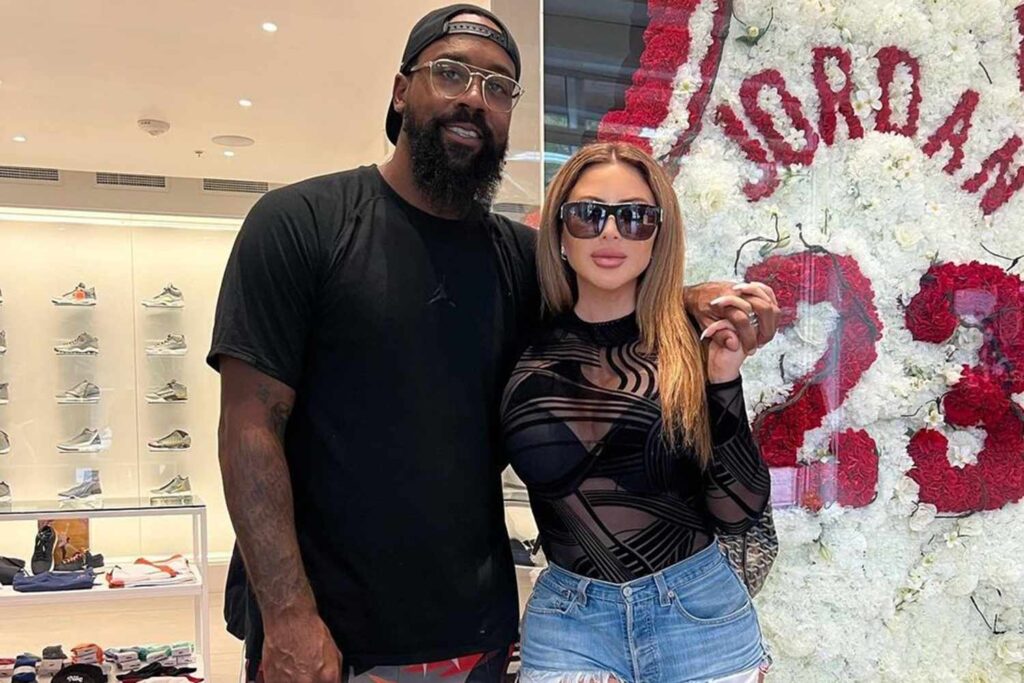 Marcus Jordan left Larsa Pippen right