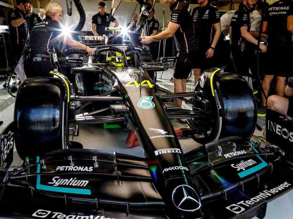 Mercedes crew working on Hamilton's W14