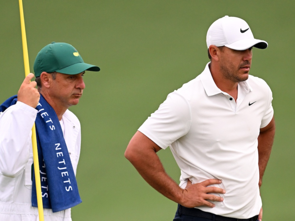 Brooks Koepka and his caddie [Image Credit: Bunkered]