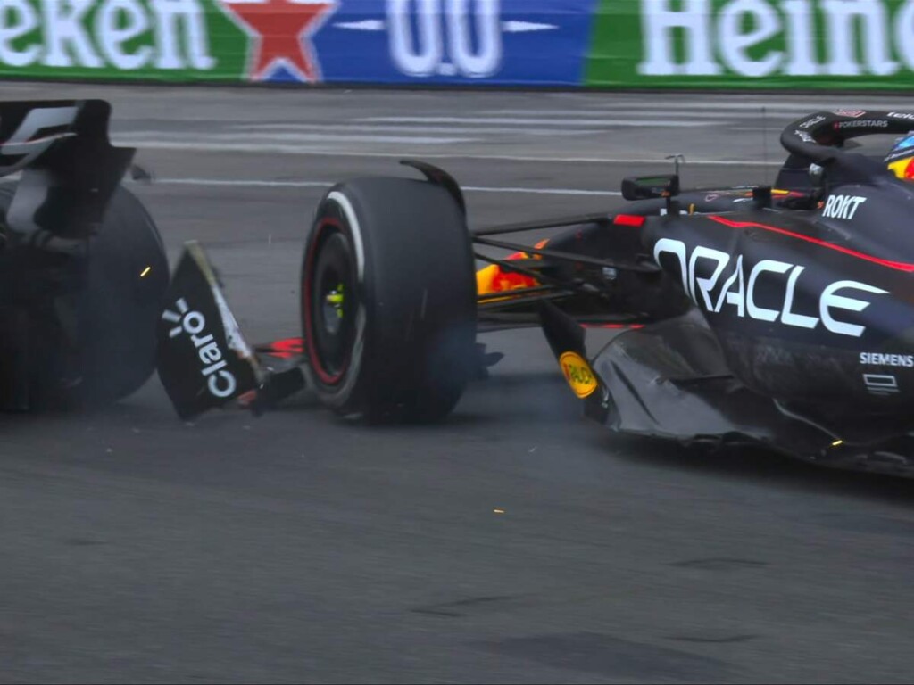 Sergio Perez makes contact with Kevin Magnussen, image via Twitter