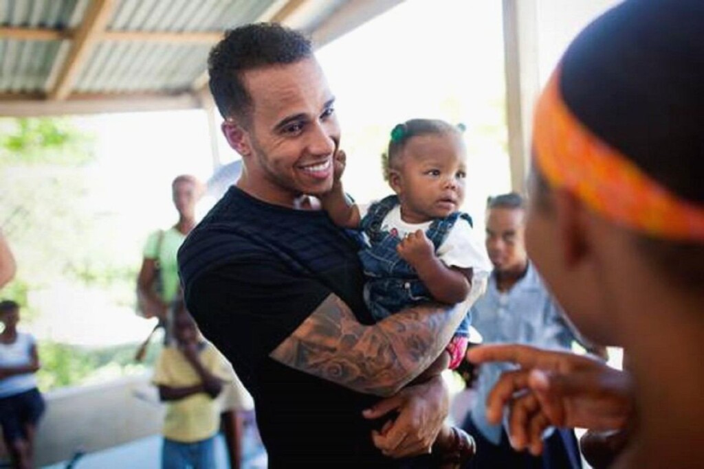 Lewis Hamilton with African kids