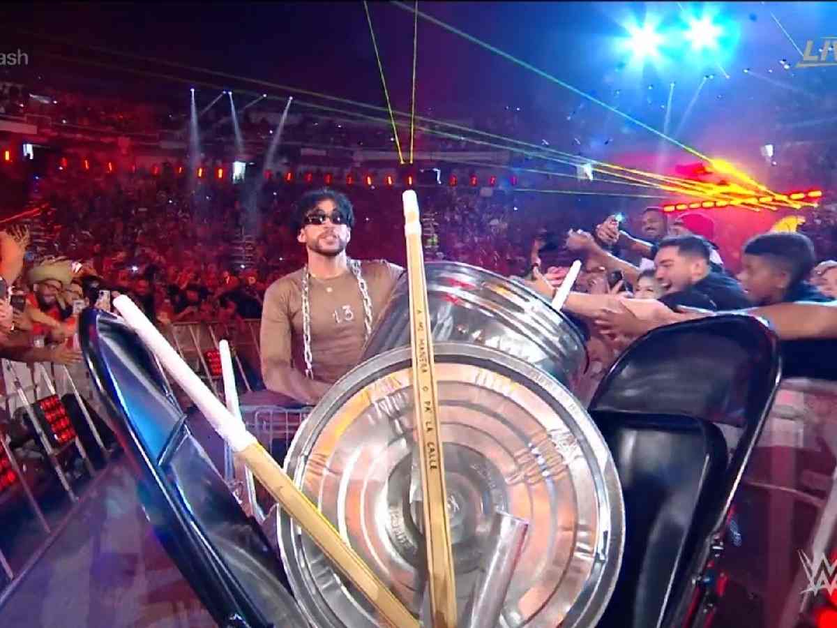 Which song did Bad Bunny walk out to at WWE Backlash in Puerto Rico?