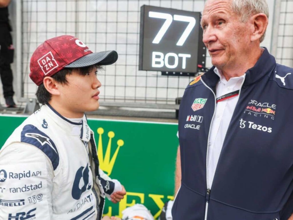 Yuki Tsunoda with Red Bull's racing advisor, helmut Marko