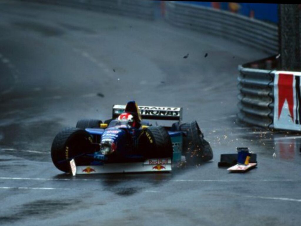 Johnny Herbert crashes out at the 1997 Monaco GP