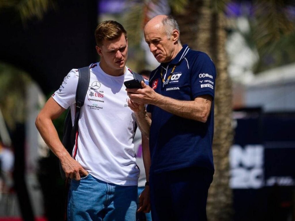 Schumacher with Alpha Tauri Team Principal Franz Tost (Image via Motorsport.com)