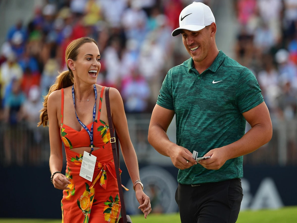 Brooks Koepka gushes over Jena Sims’ baby bump at Miami Swim Week Walk amidst hustling LIV-PGA week