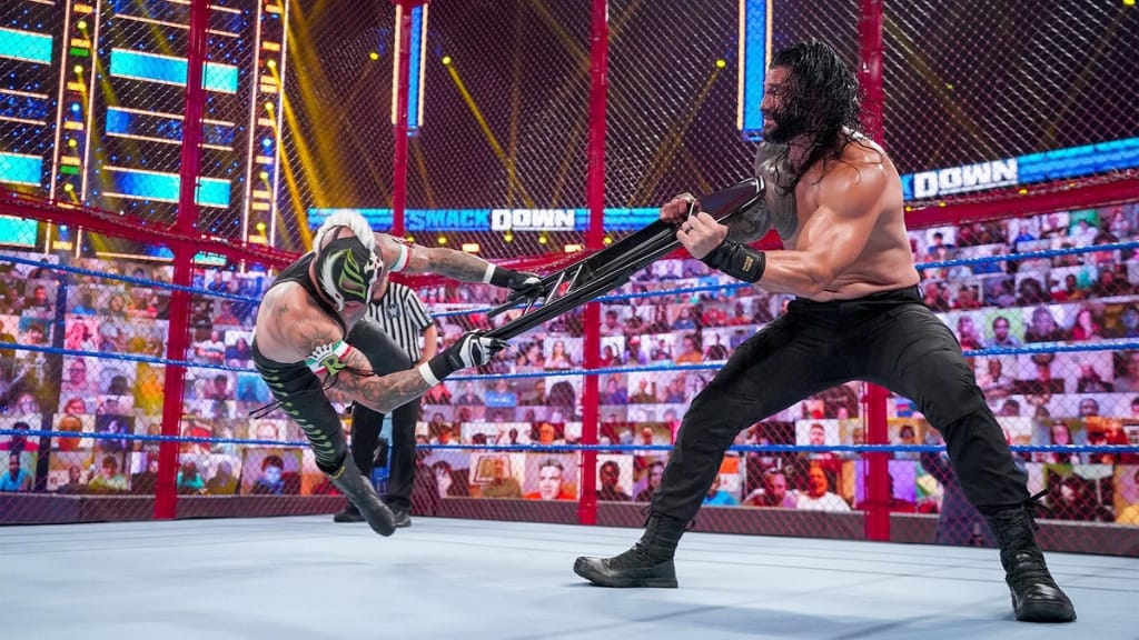 Rey Mysterio vs. Roman Reigns in Hell In A Cell (via WWE)