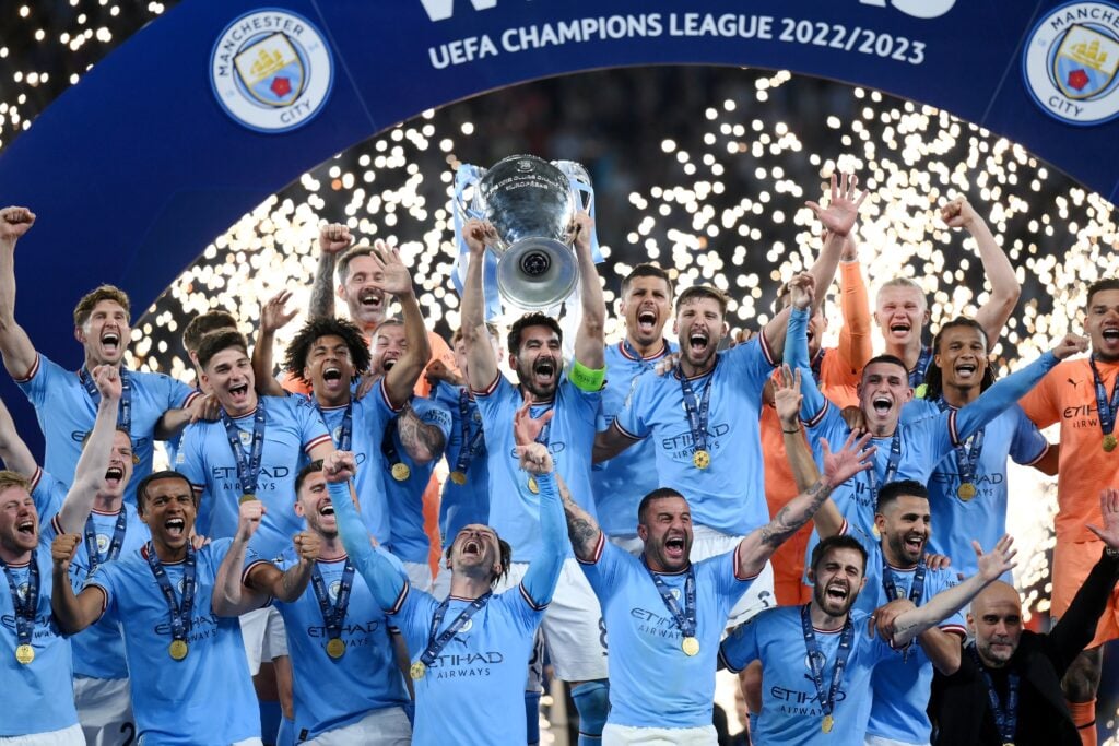 Fans celebrate as Manchester City lifts their first UCL trophy