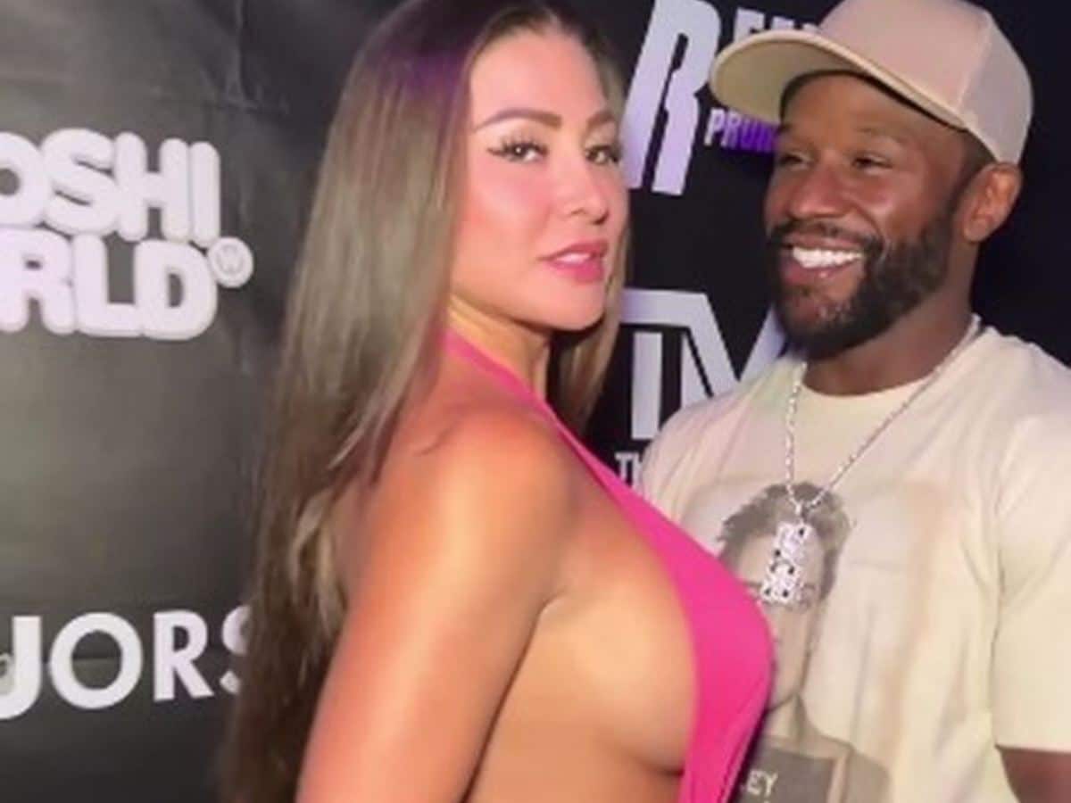 WATCH! Floyd Mayweather struggles to keep composure as 33-year-old Playboy Model distracts him during ‘face-off’