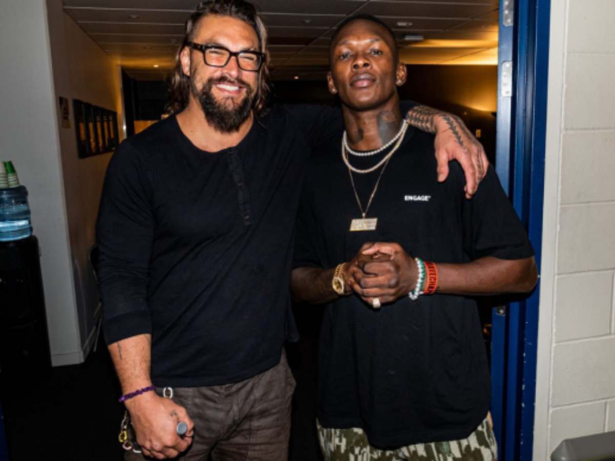 “Should cast you in Aquaman,” – Fans react to Israel Adesanya’s picture with Jason Momoa enjoying a drink together