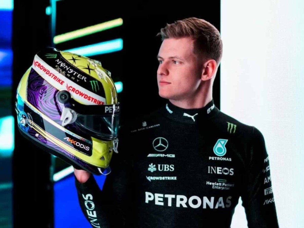 Mick Schumacher with his 2023 driver helmet (image via News18)